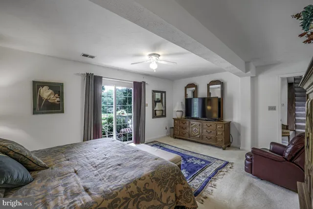 a view of a street with a yard