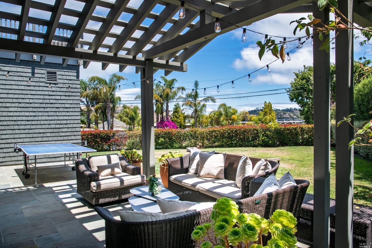 208 Reed Boulevard Mill Valley, CA 94941 - Photo 10 of 47 Outside the living area, enjoy this outdoor arbor, which shades the sun on the patio. At night, this area is magical!