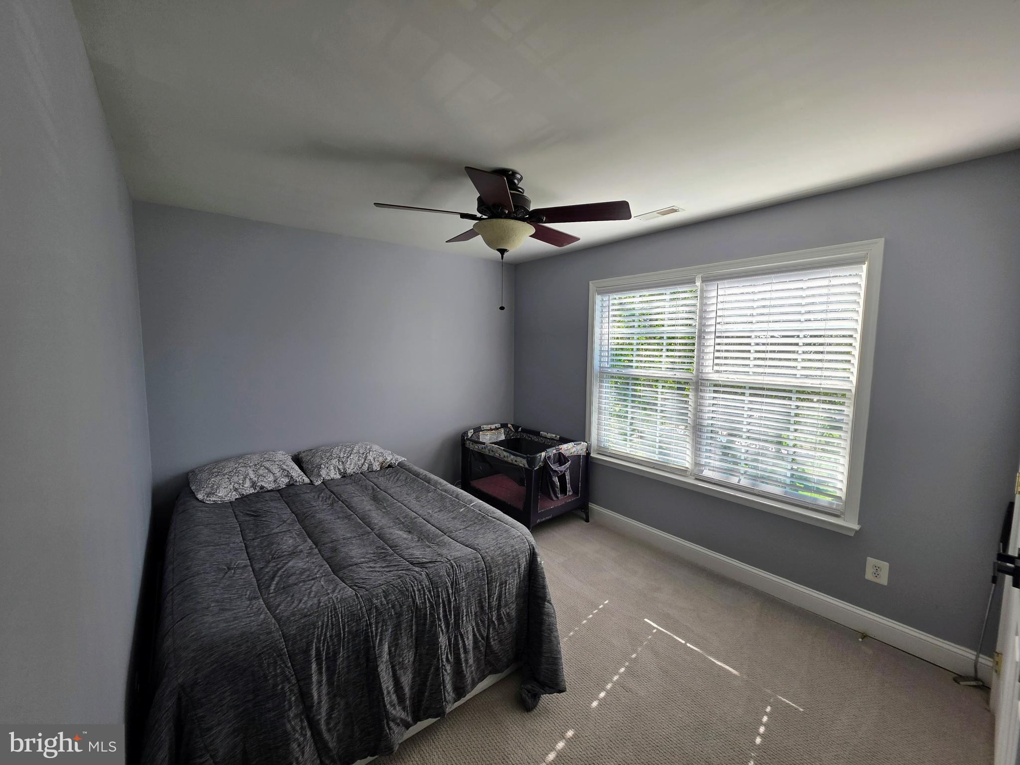 8 Elk Lane Elkton, MD 21921 - Photo 10 of 19 a bedroom with a bed and a window