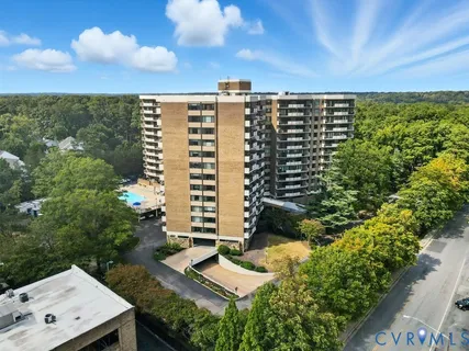 a bathroom with a bathtub and a sink