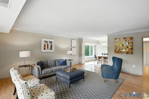 a living room with furniture and a couch