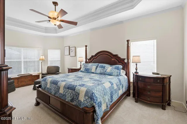 a view of a room that has a bed and a closet