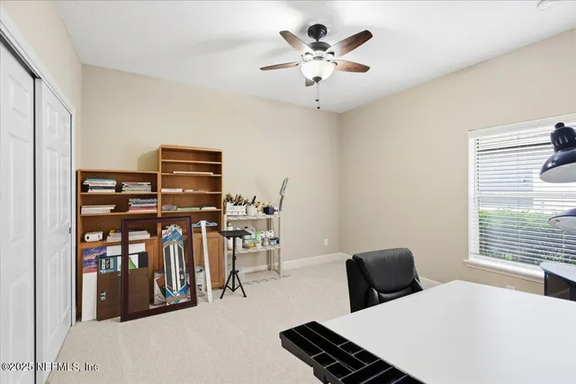 a bathroom with a toilet a sink and a mirror