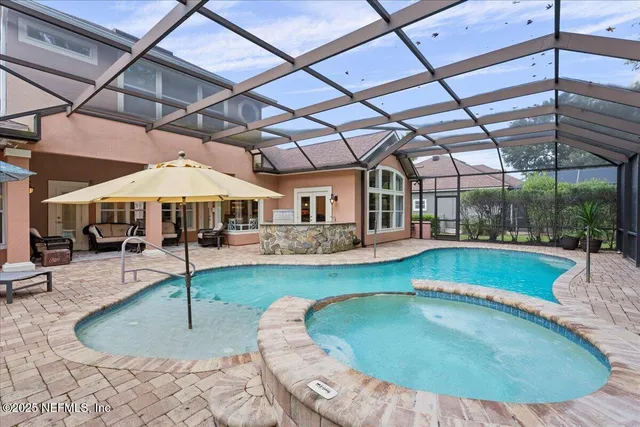 a front view of a house with outdoor seating