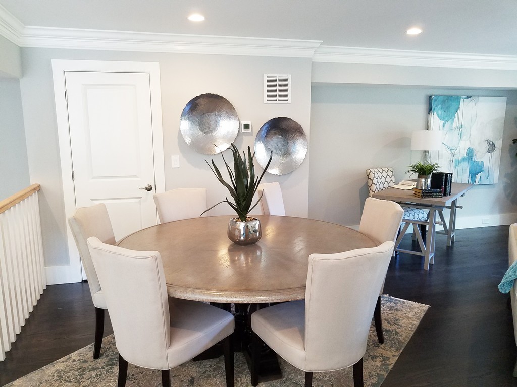 1525 Beacon Street, Unit 3 Newton, MA 02468 - Photo 12 of 21 a view of a dining room with furniture and wooden floor