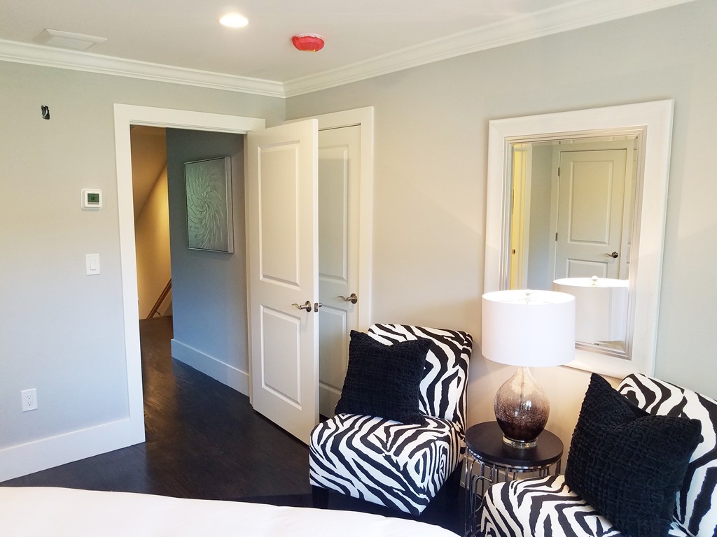 1525 Beacon Street, Unit 3 Newton, MA 02468 - Photo 16 of 21 a living room with furniture and wooden floor