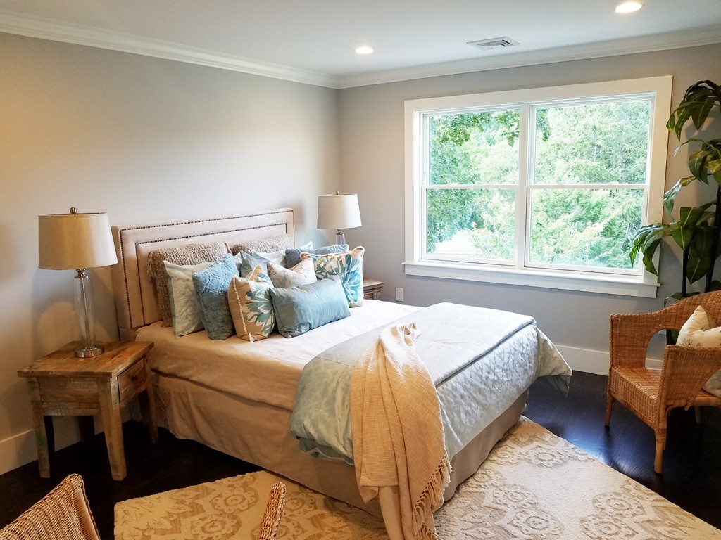 1525 Beacon Street, Unit 3 Newton, MA 02468 - Photo 18 of 21 a bed room with a bed and a chair