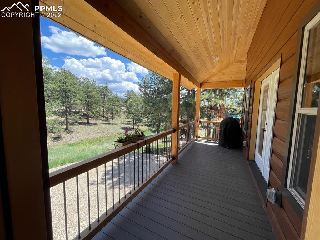 188 Keepsake Loop Westcliffe, CO 81252 - Photo 18 of 37 a view of a porch with wooden floor and outdoor space
