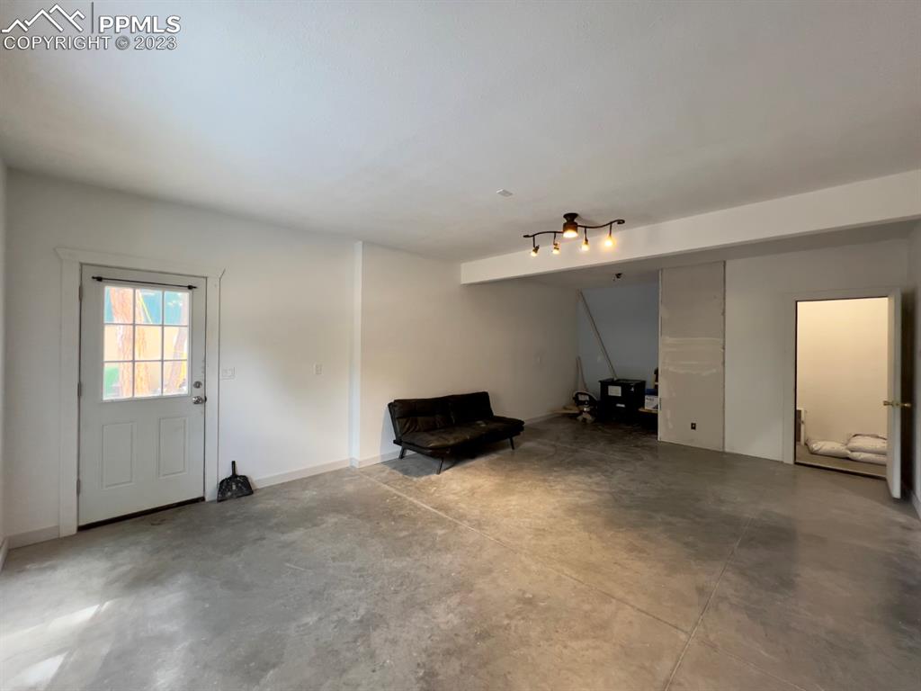 188 Keepsake Loop Westcliffe, CO 81252 - Photo 27 of 37 a view of a livingroom and a empty room