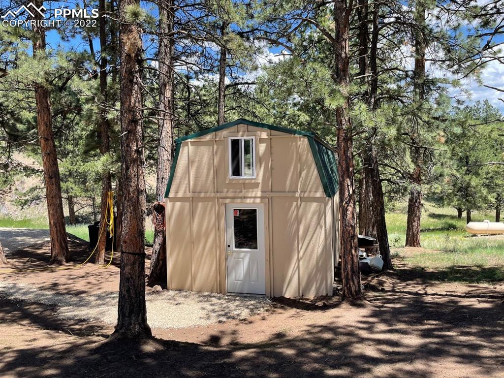 188 Keepsake Loop Westcliffe, CO 81252 - Photo 34 of 37 a front view of a house with a yard