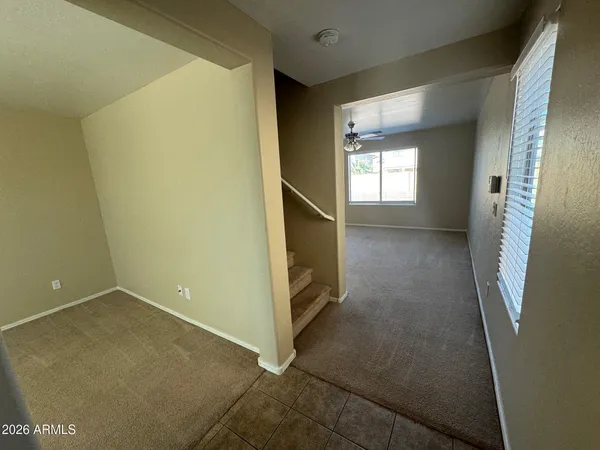an empty room with windows