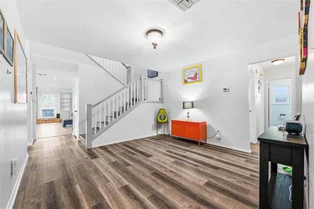 a bedroom with bed and toys