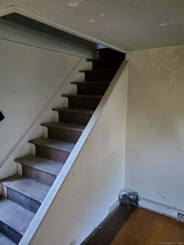 a bathroom with a sink a toilet and bathtub