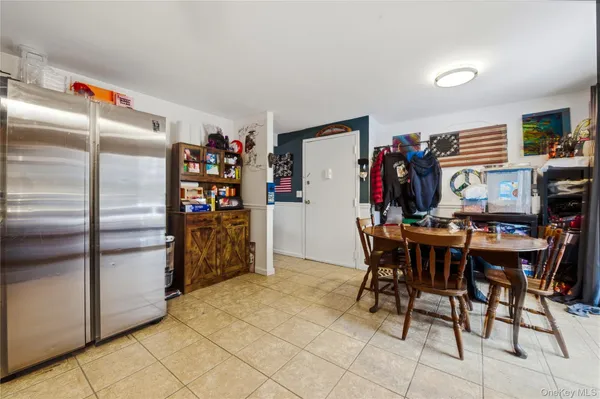 a view of a kitchen with appliances and cabinets
