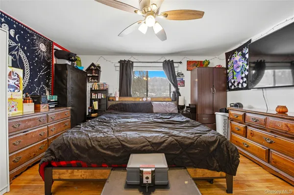 a room with furniture and flat screen tv