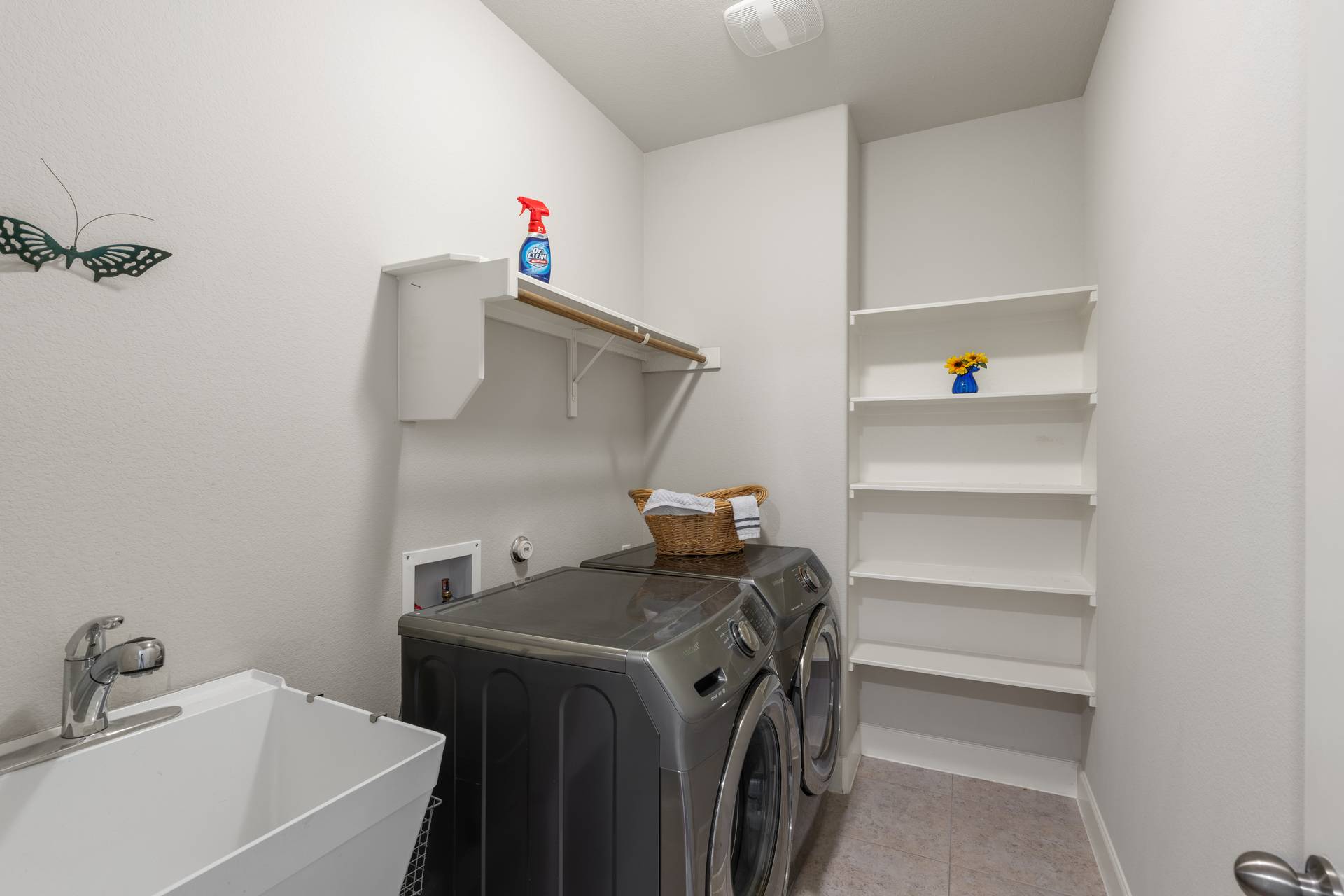 3516 Venezia View Leander, TX 78641 - Photo 3 of 40 Laundry room featuring washer and clothes dryer and light tile patterned floors