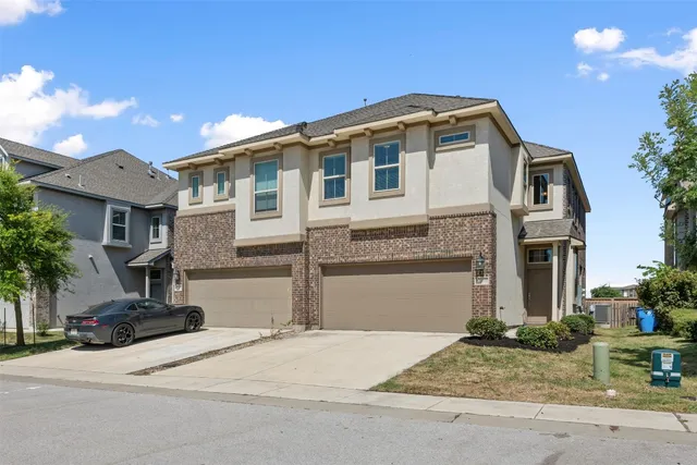a front view of a house with entertaining space