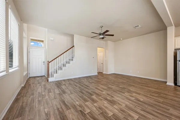 a view of a livingroom with a hardwood floor