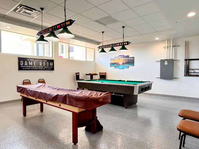 340 Horizon West, Unit 203 Boynton Beach, FL 33435 - Photo 24 of 45 a room with furniture and a table