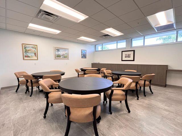 340 Horizon West, Unit 203 Boynton Beach, FL 33435 - Photo 29 of 45 a view of a dining room with furniture