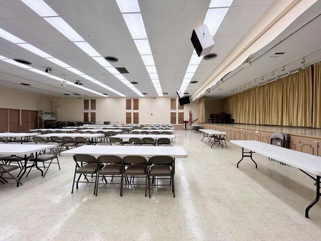 340 Horizon West, Unit 203 Boynton Beach, FL 33435 - Photo 30 of 45 a room with lots of furniture and a large window