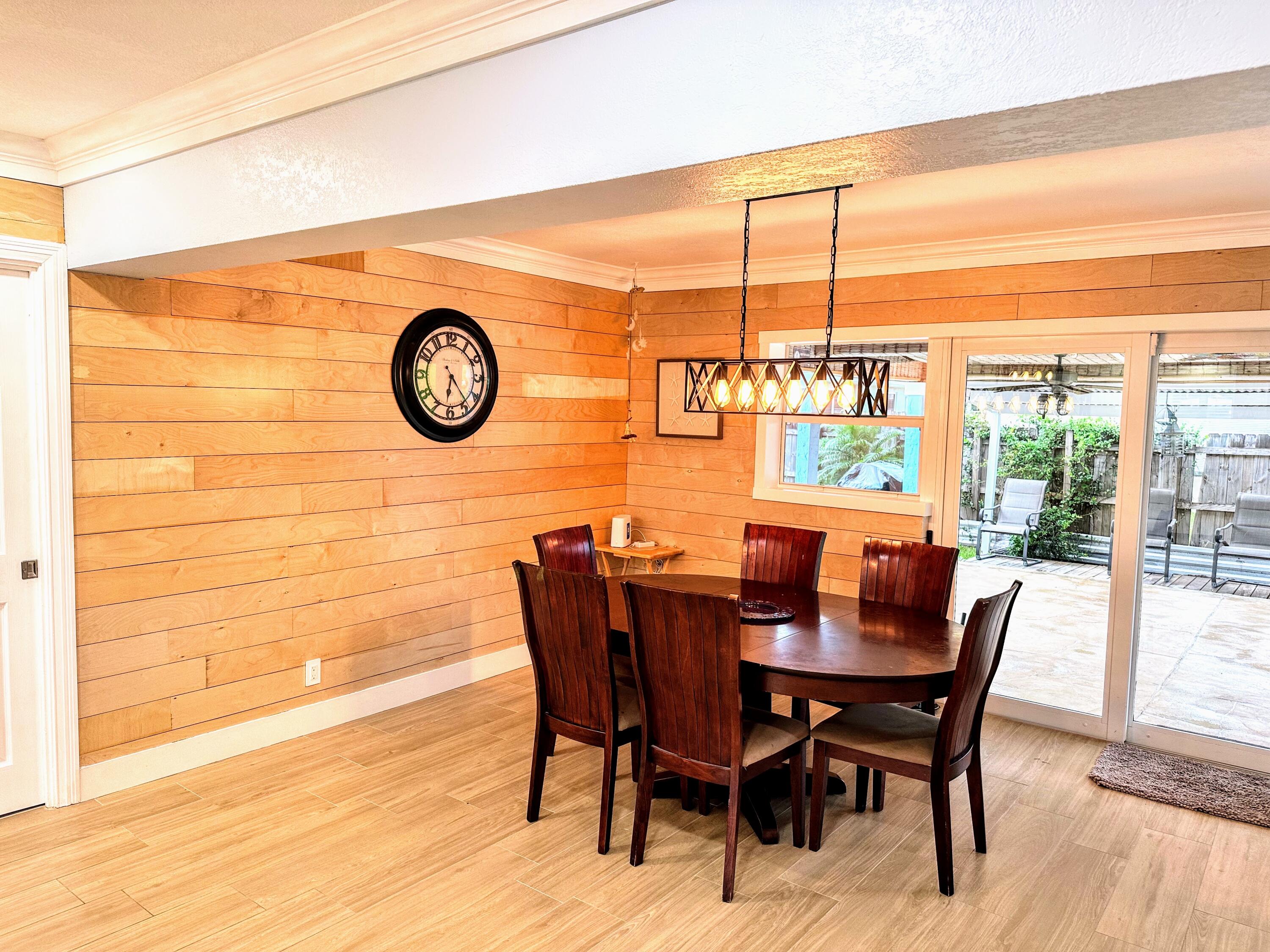 469 Northeast 30th Street Boca Raton, FL 33431 - Photo 9 of 24 a view of a dining room with furniture window and outside view