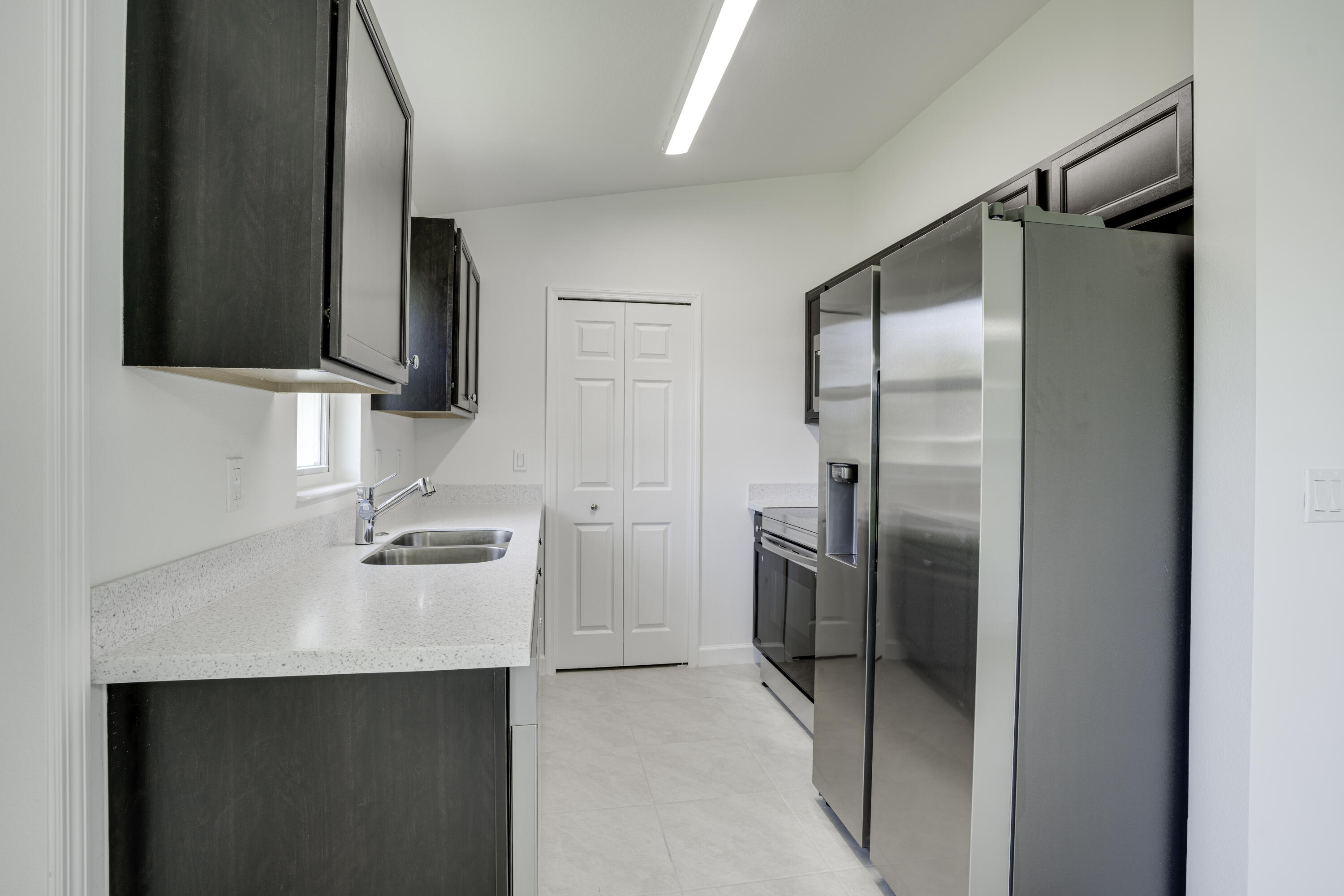 5264 Southeast 43rd Street Okeechobee, FL 34974 - Photo 6 of 16 a bathroom with a sink and a mirror