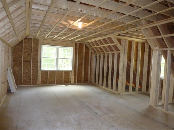 92 Kendall Road Holden, MA 01520 - Photo 11 of 12 a view of a room with wooden walls and a window