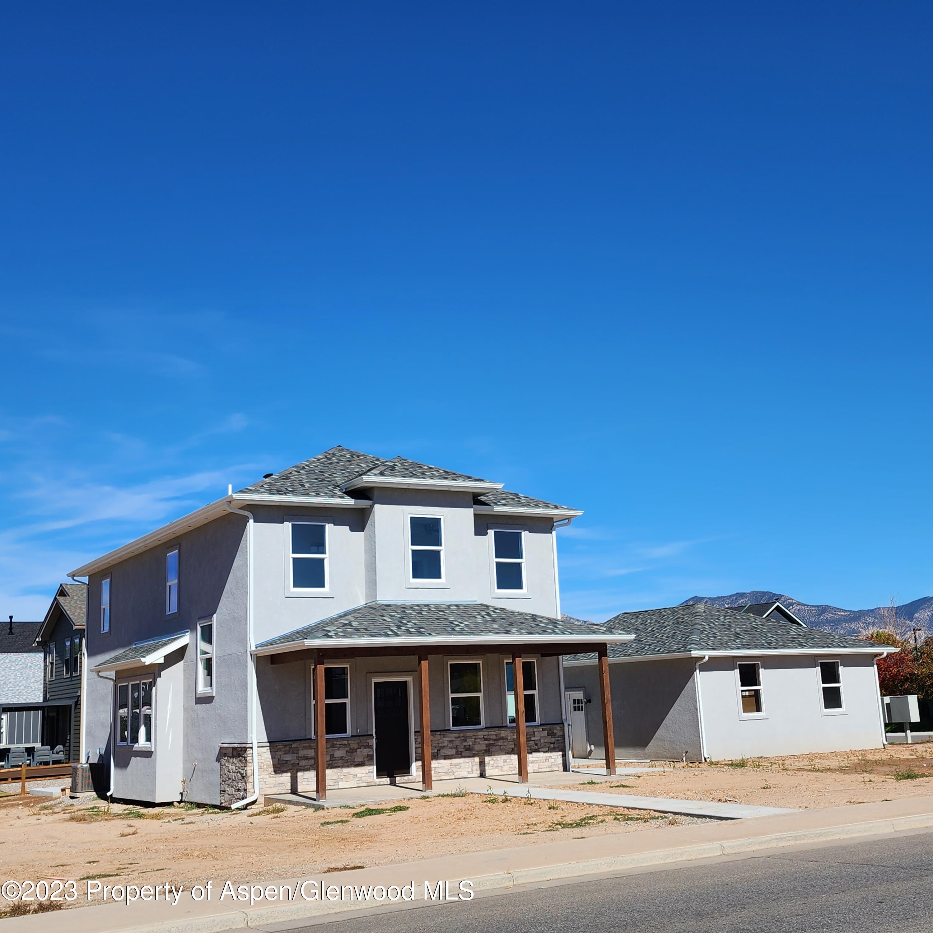 890 East 16th Street Rifle, CO 81650 - Photo 2 of 17 front view of a house with a street