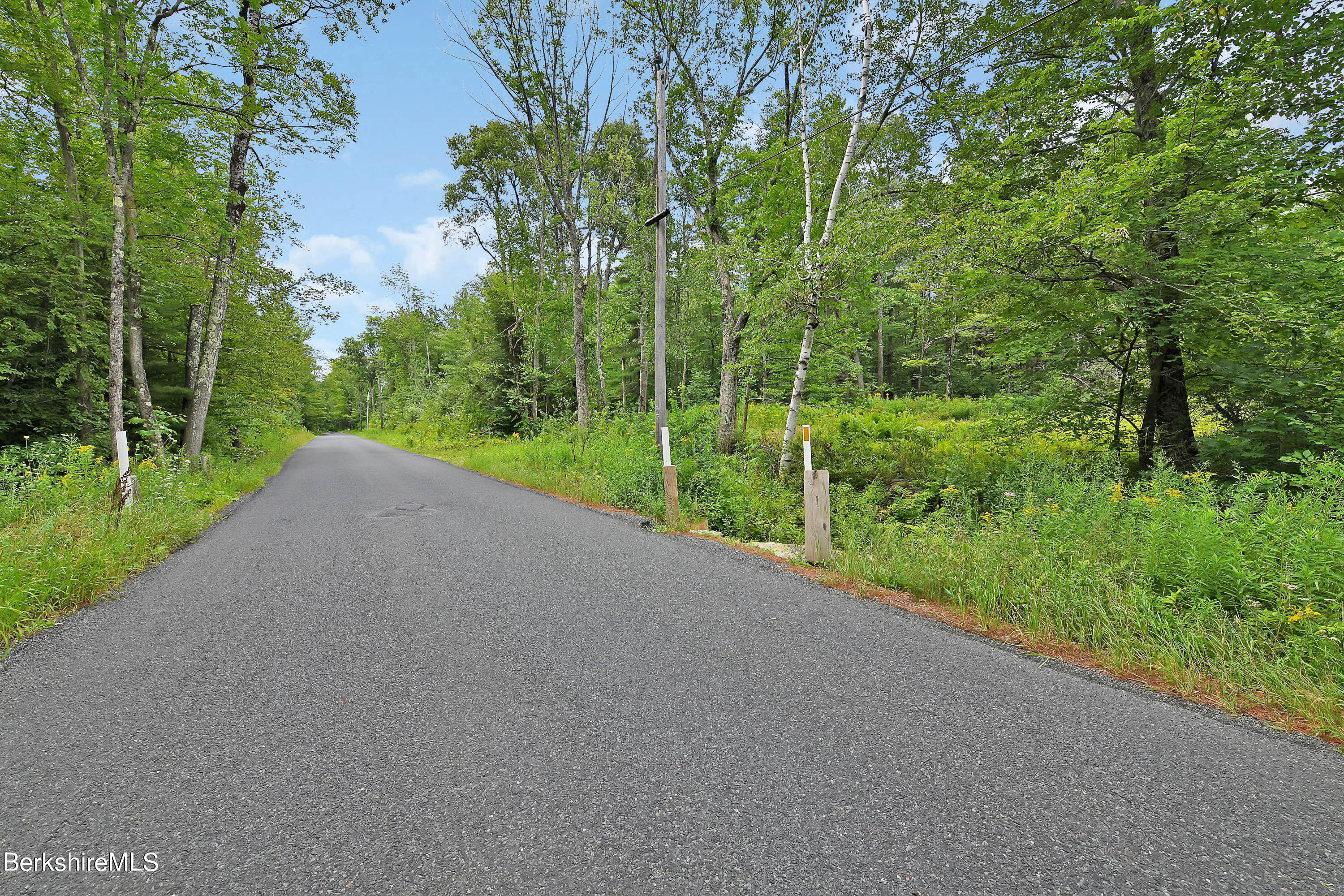 0 Town Hill Road Sandisfield, MA 01255 - Photo 15 of 21 a view of a field with a tree in the background