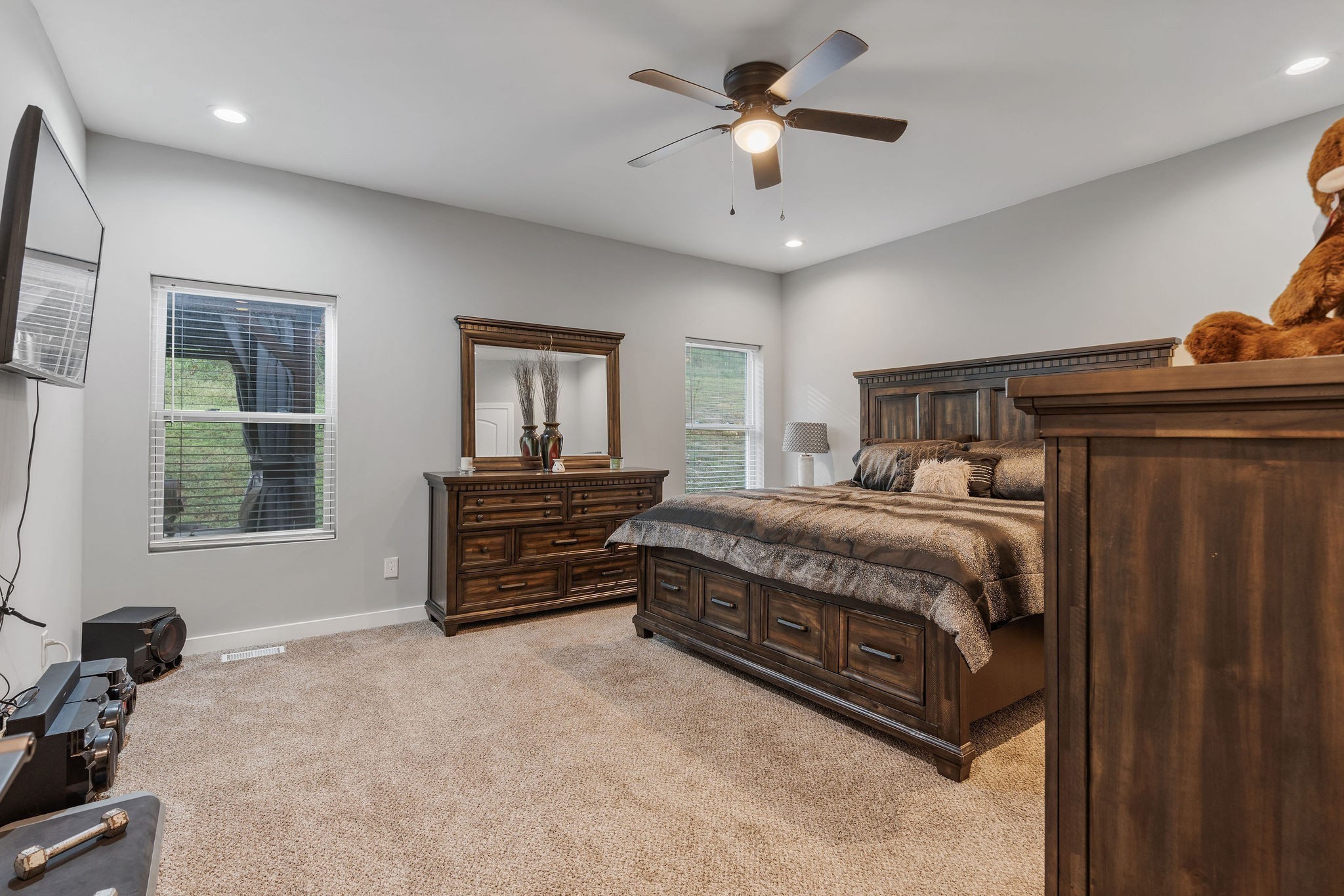 286 Emily Lane Bell Buckle, TN 37020 - Photo 24 of 38 a bedroom with a bed and a ceiling fan