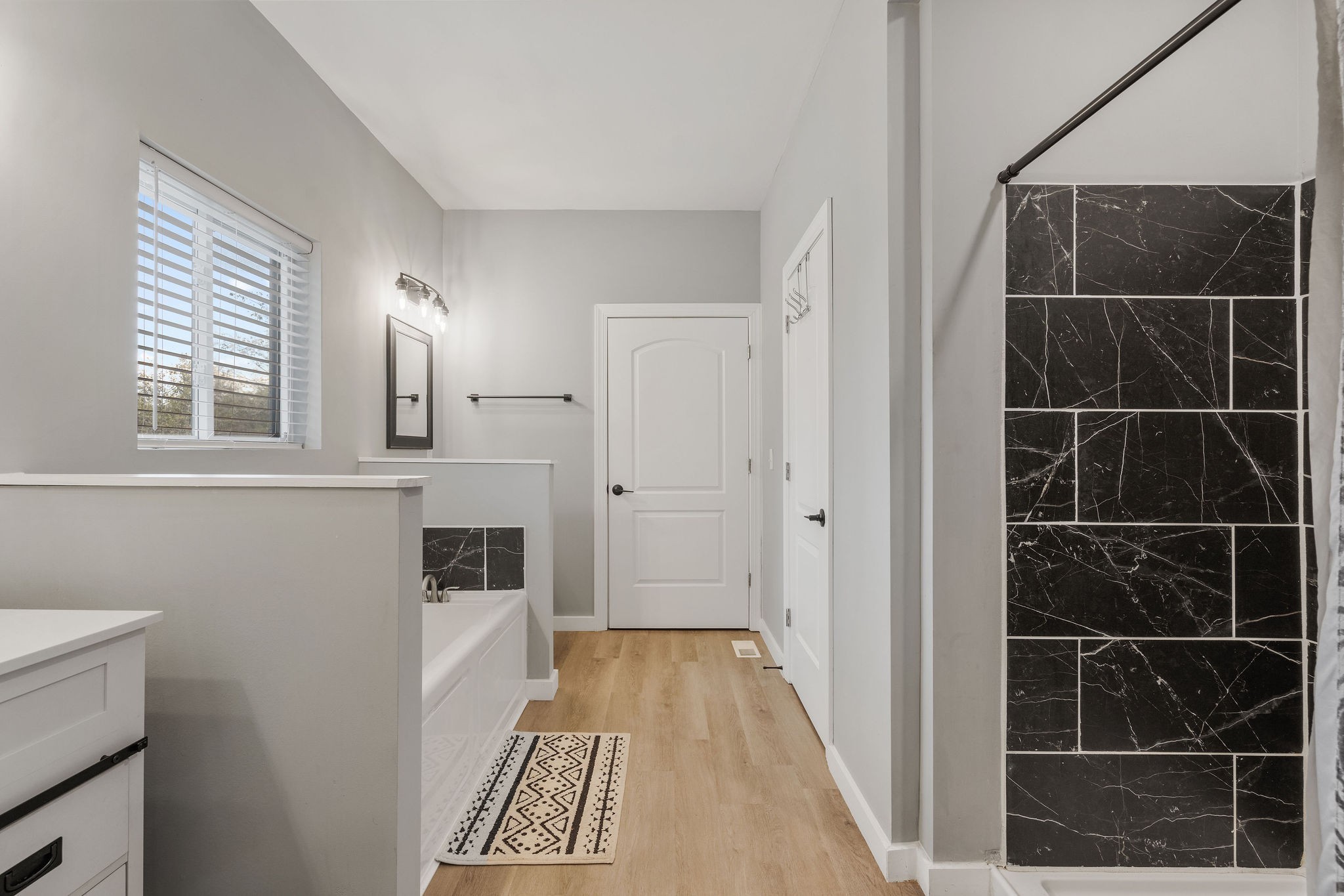 286 Emily Lane Bell Buckle, TN 37020 - Photo 26 of 38 a bathroom with granite countertop a toilet a sink a shower and a window
