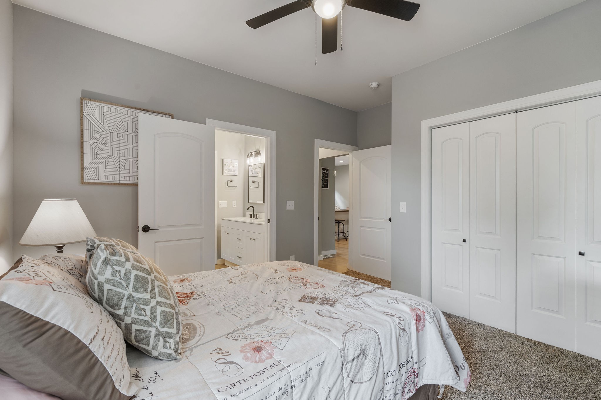 286 Emily Lane Bell Buckle, TN 37020 - Photo 30 of 38 a bedroom with a bed and a chandelier