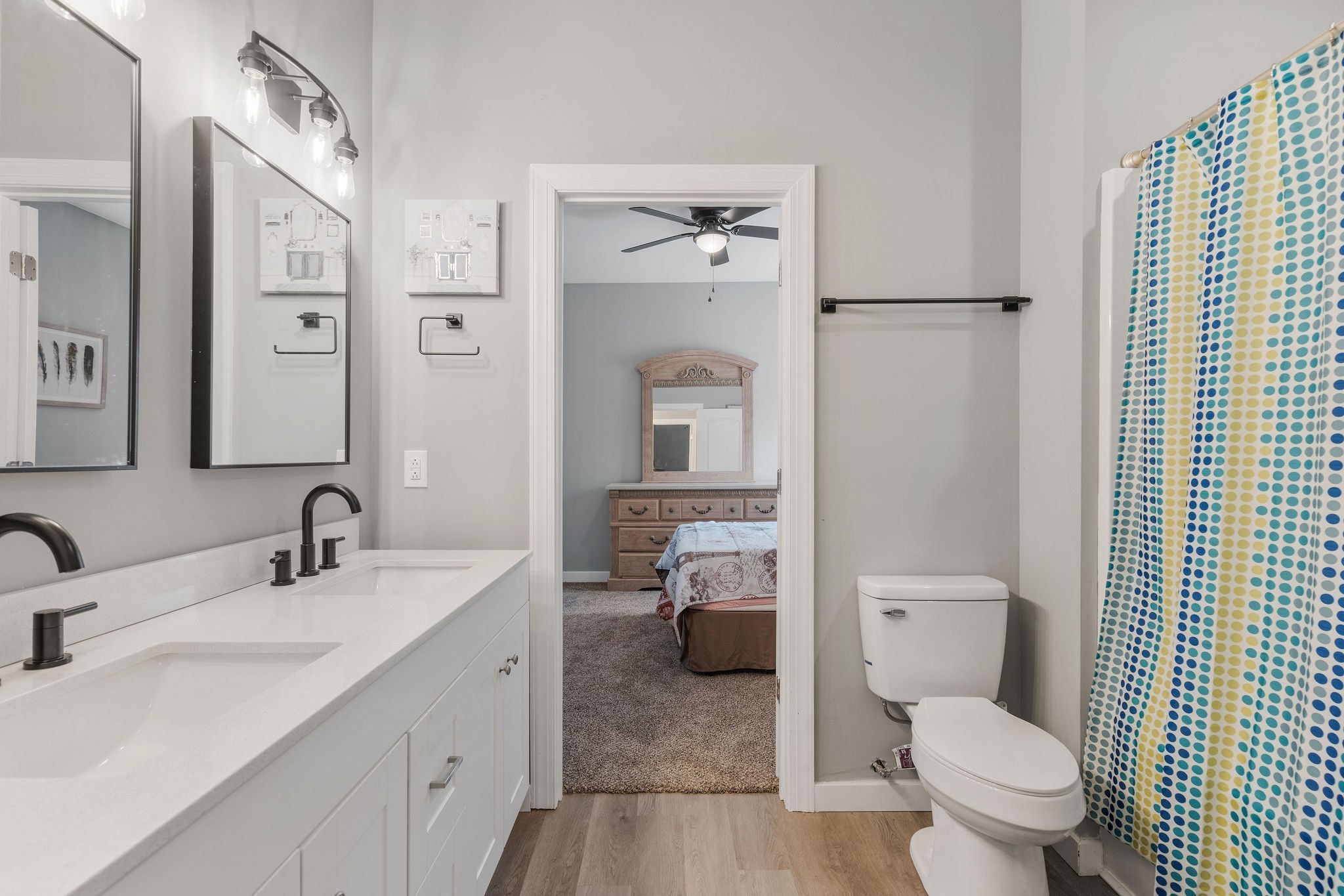 286 Emily Lane Bell Buckle, TN 37020 - Photo 32 of 38 a en suite bathroom with a toilet a sink and a mirror