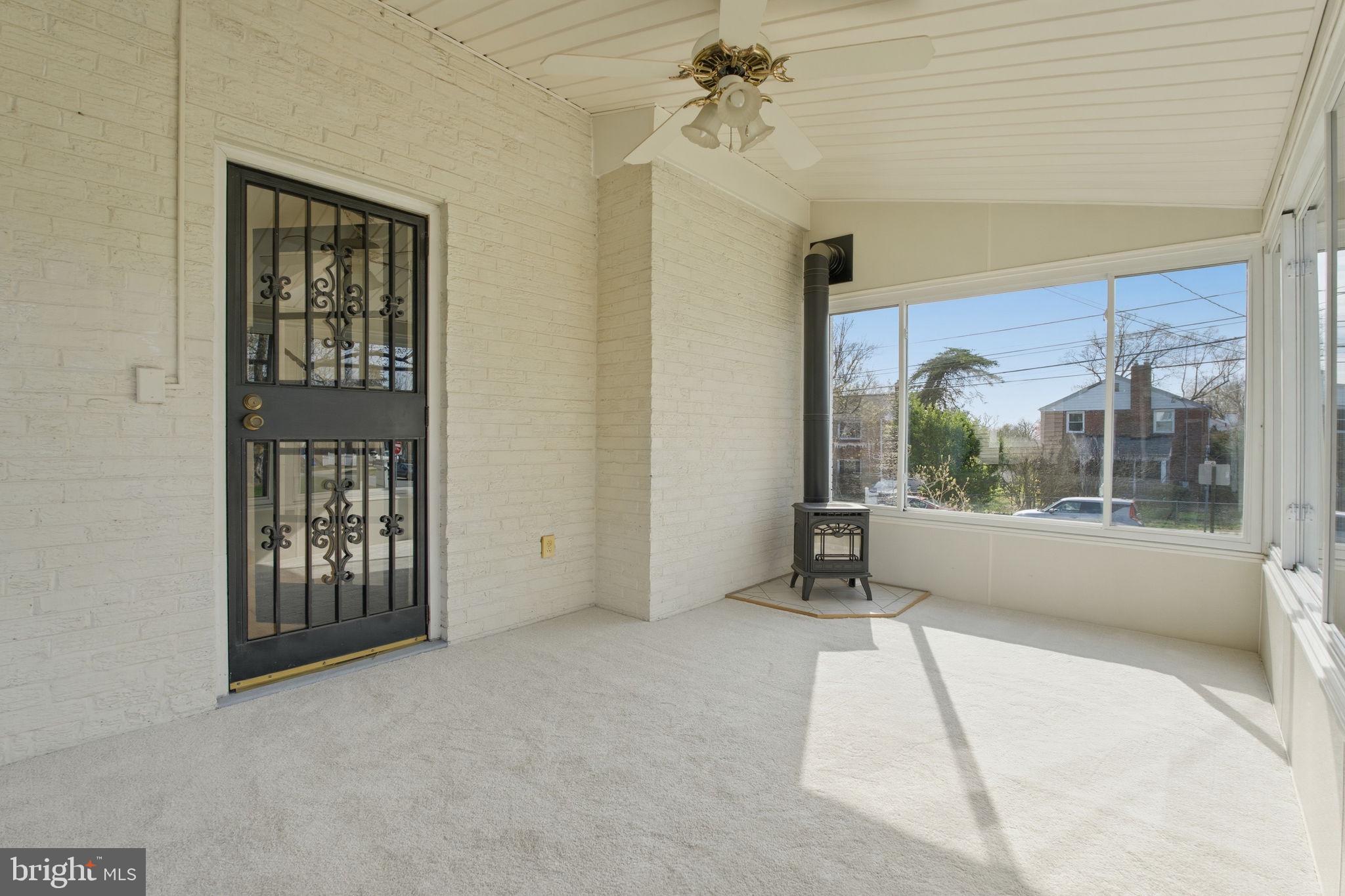 11527 Grandview Avenue Silver Spring, MD 20902 - Photo 31 of 36 a view of an empty room with a window