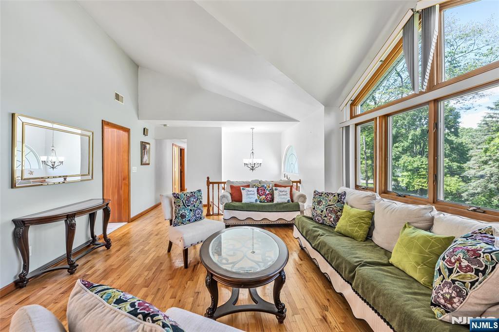 21 Marcia Road Ringwood, NJ 07456 - Photo 7 of 42 a living room with furniture and a large window