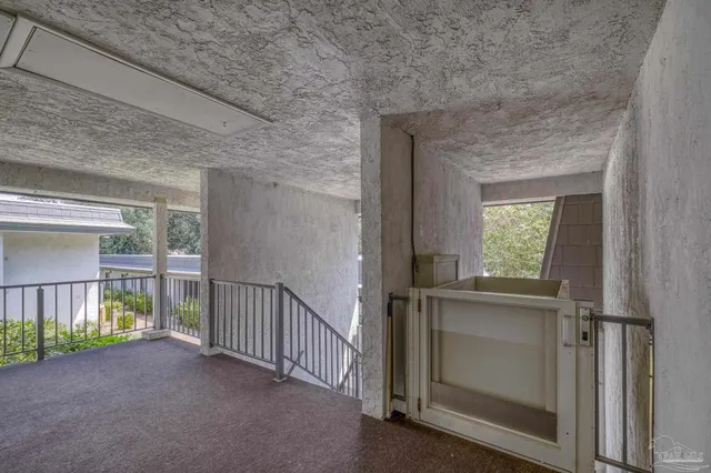 a kitchen with granite countertop a refrigerator and a stove