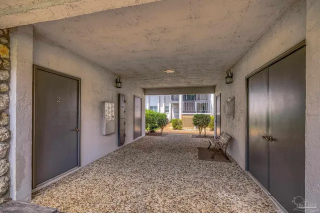 a spacious bathroom with a sink and a mirror
