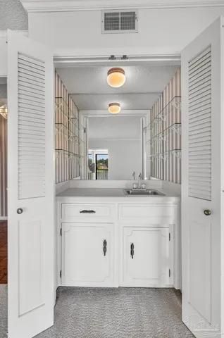 a view of a livingroom with wooden floor