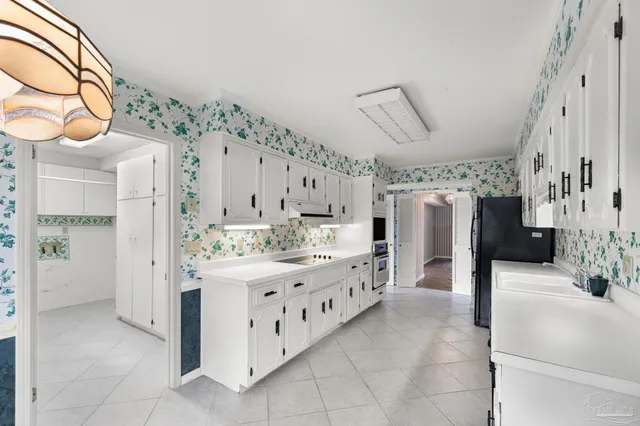 a view of a hallway with staircase