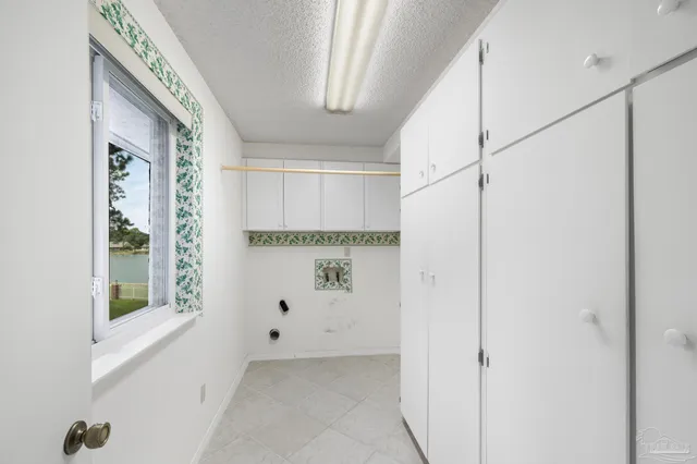 a view of a room with a large window