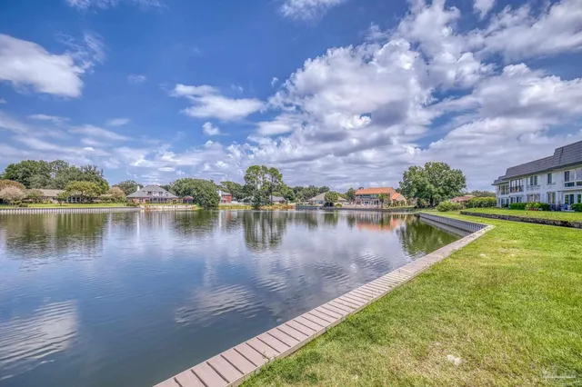 a view of a lake with a big yard