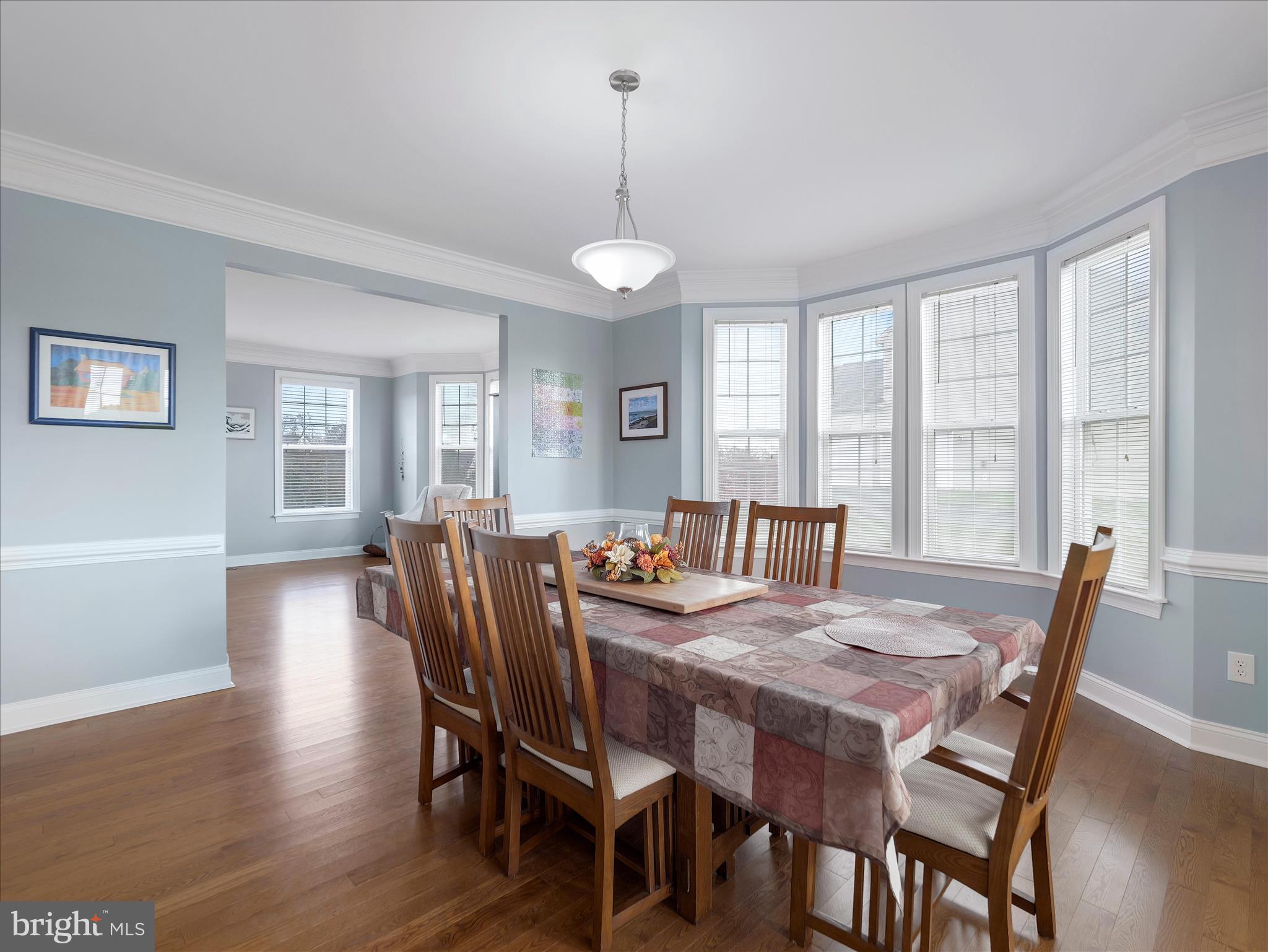 837 Triumphant Way Falling Waters, WV 25419 - Photo 26 of 66 a view of a dining room with furniture window and wooden floor