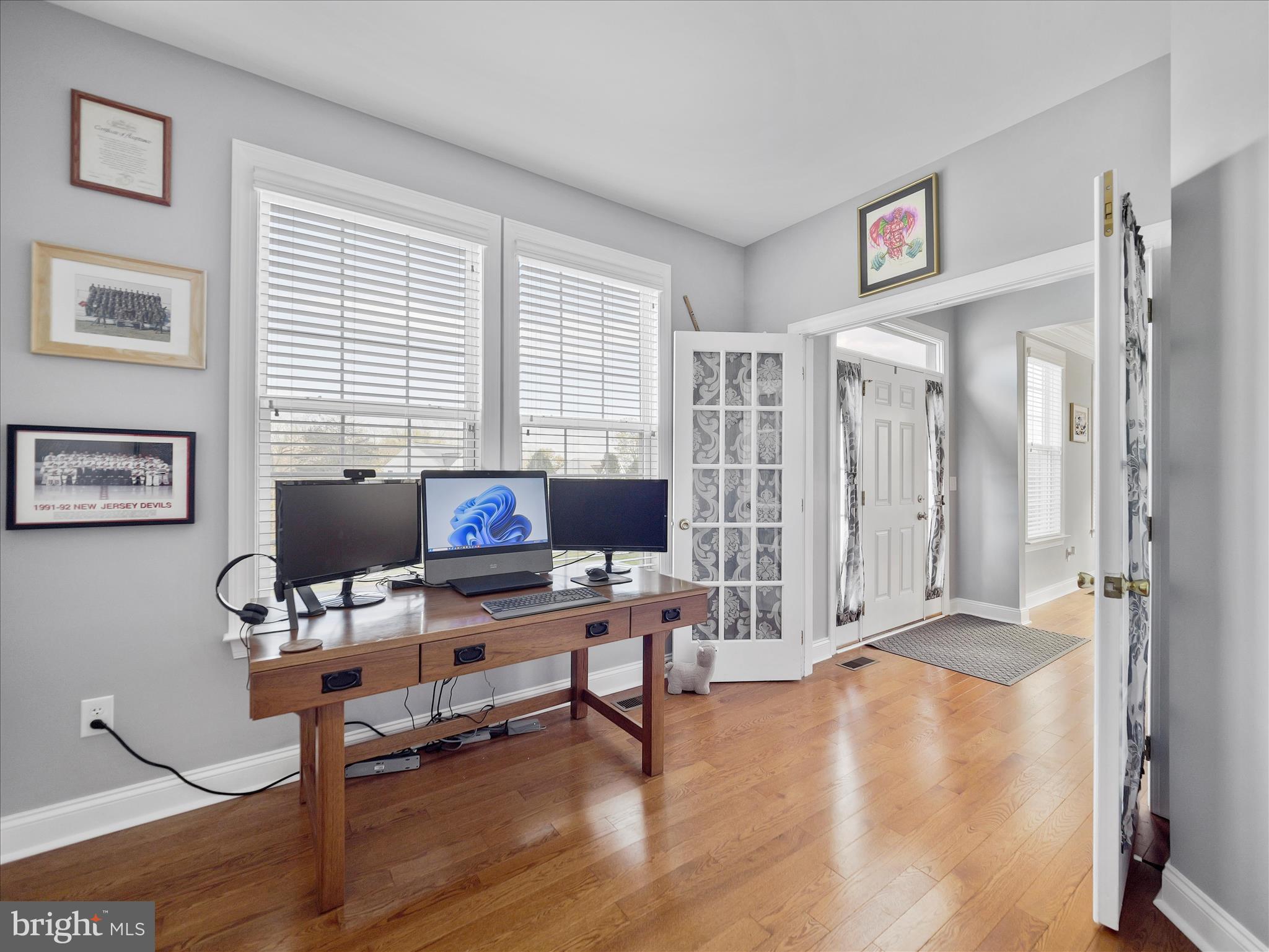 837 Triumphant Way Falling Waters, WV 25419 - Photo 39 of 66 a view of a livingroom with workspace and a window