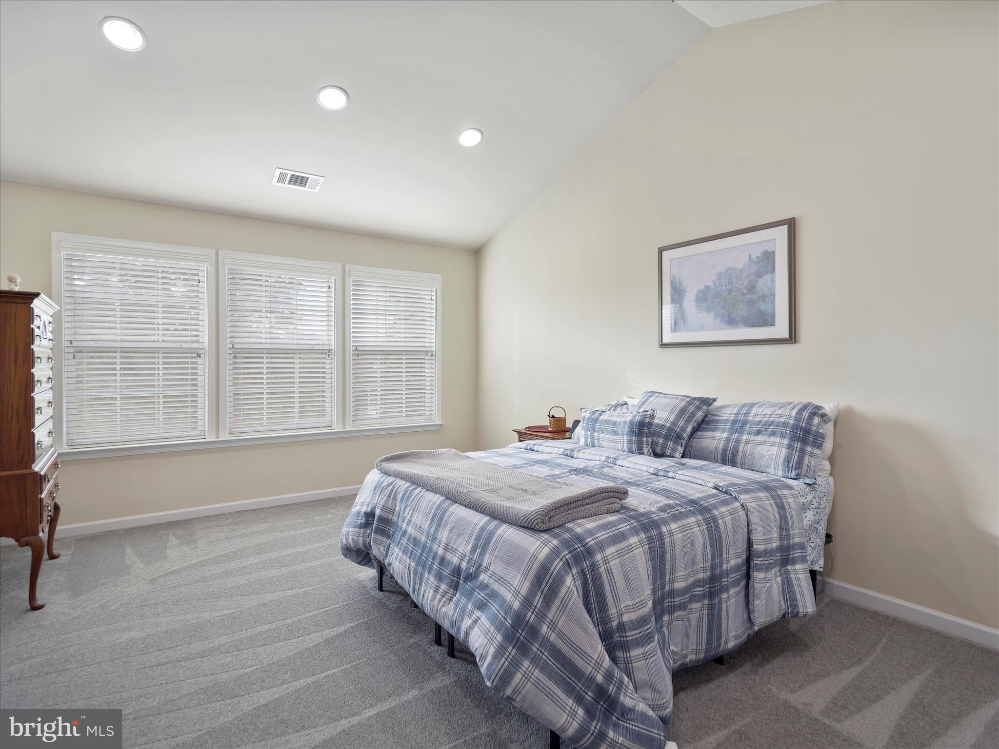 837 Triumphant Way Falling Waters, WV 25419 - Photo 44 of 66 a bedroom with a bed and wooden floor