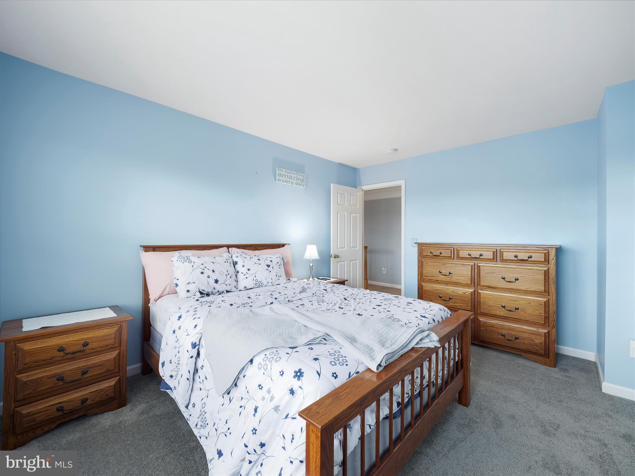 837 Triumphant Way Falling Waters, WV 25419 - Photo 54 of 66 a bedroom with a bed and dresser