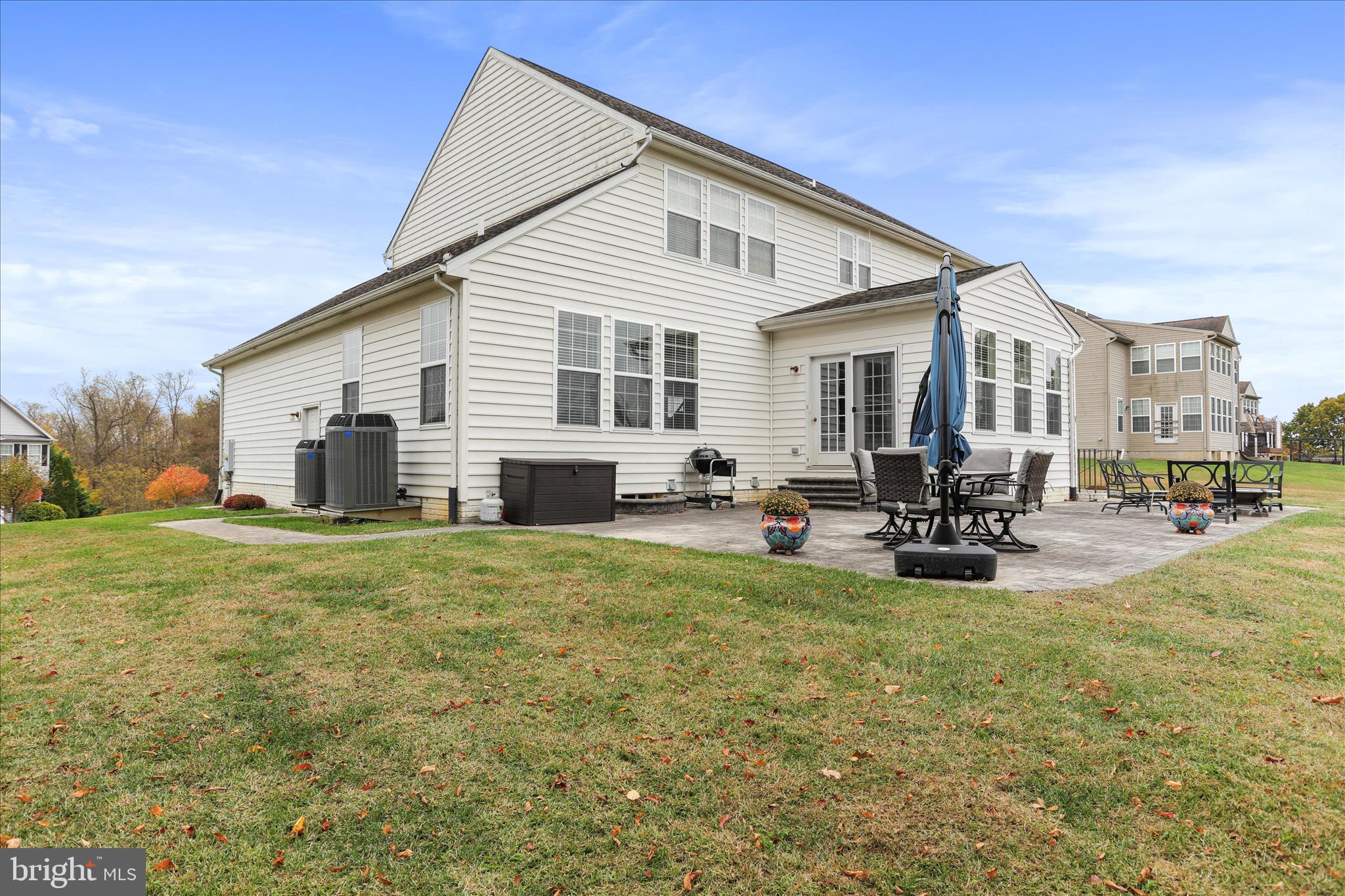 837 Triumphant Way Falling Waters, WV 25419 - Photo 10 of 66 a view of a house with backyard and sitting area