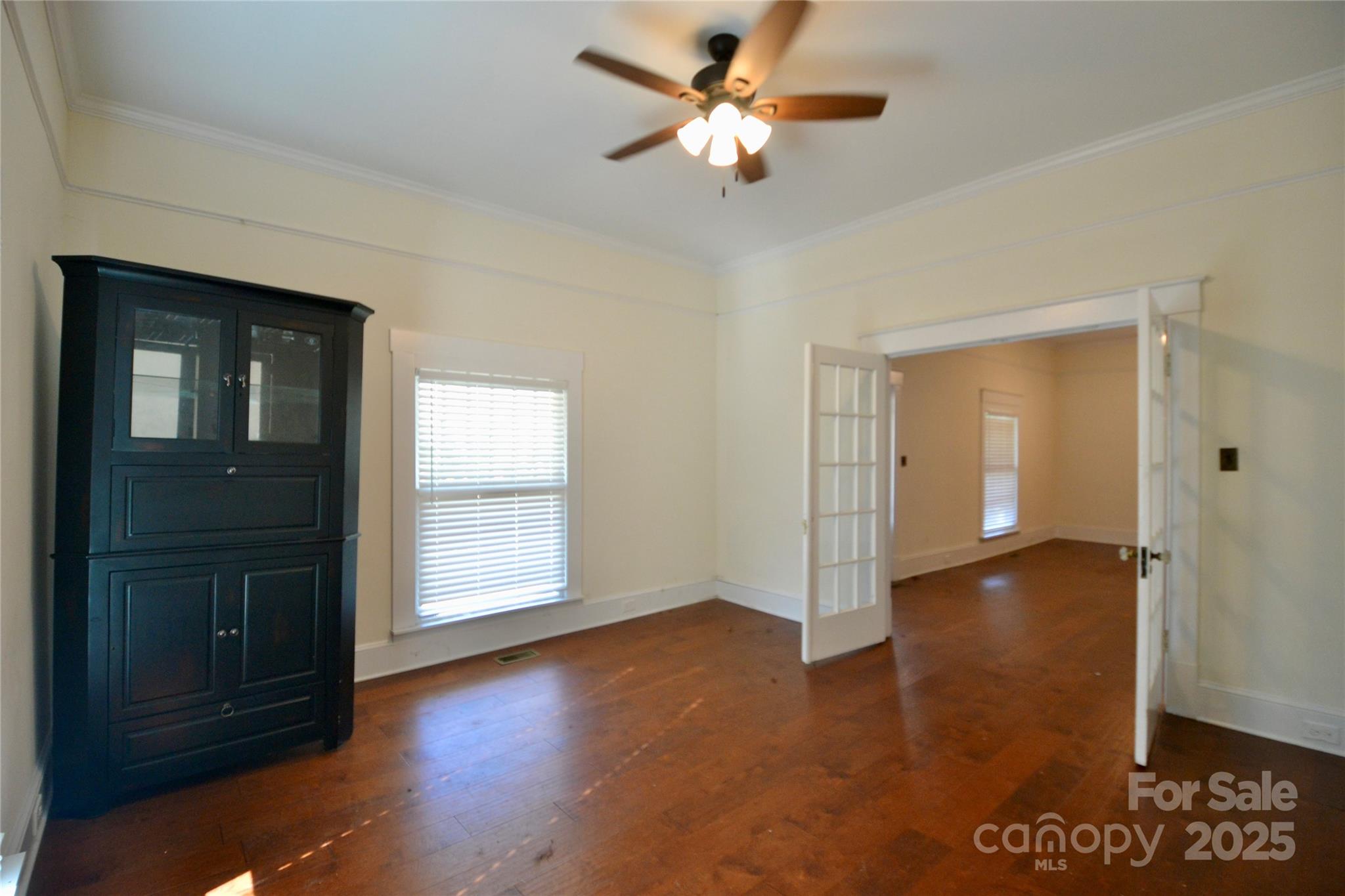 512 2nd Street Spencer, NC 28159 - Photo 13 of 33 wooden floor in an empty room with a window