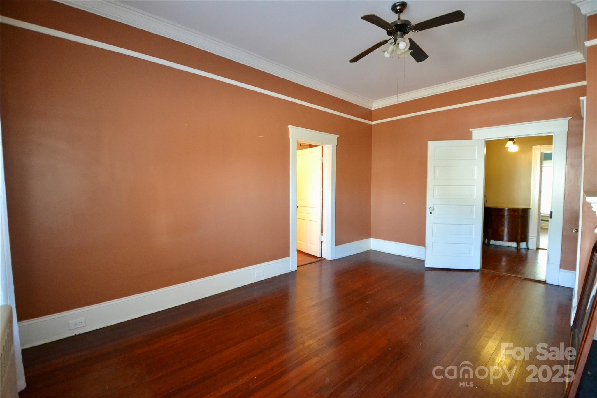 512 2nd Street Spencer, NC 28159 - Photo 16 of 33 a view of empty room with wooden floor and fan
