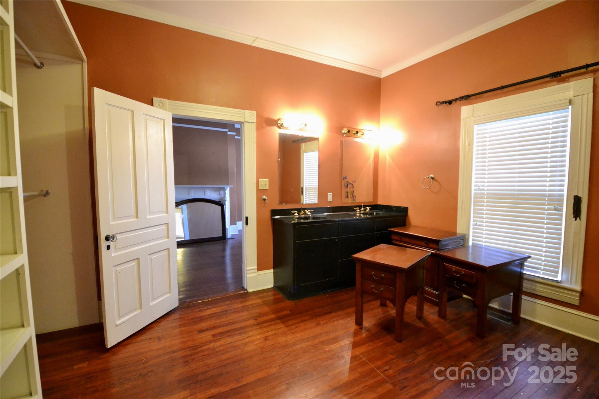 512 2nd Street Spencer, NC 28159 - Photo 18 of 33 a kitchen with stainless steel appliances kitchen island granite countertop a table chairs and a refrigerator
